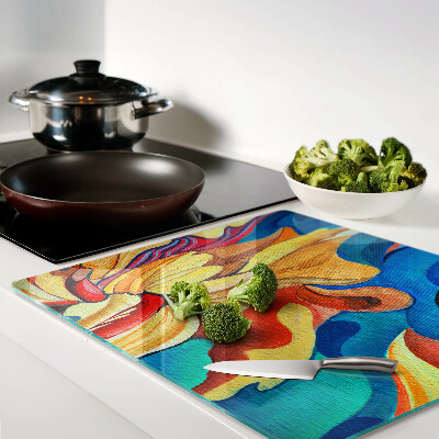 Glass kitchen board Colorful flowers on an abstract background