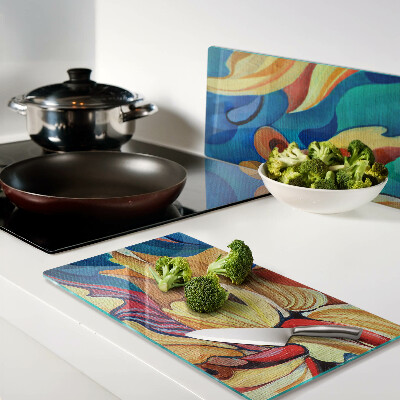 Glass kitchen board Colorful flowers on an abstract background