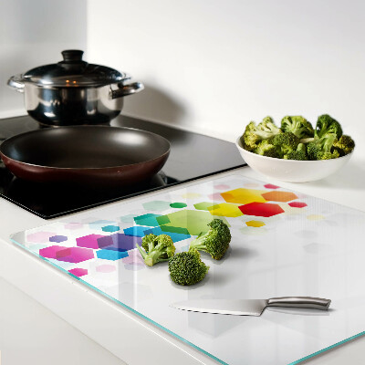Glass kitchen board Colorful hexagons on the background