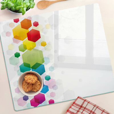 Glass kitchen board Colorful hexagons on the background