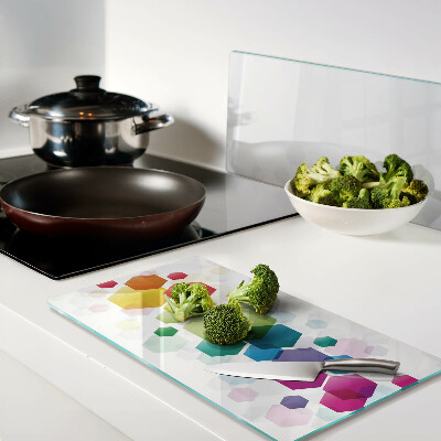 Glass kitchen board Colorful hexagons on the background