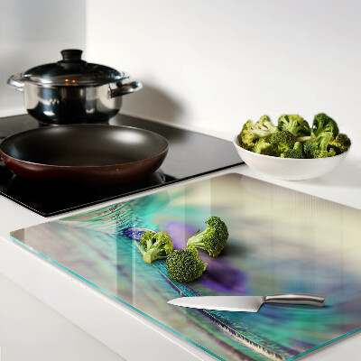 Glass kitchen board A drop on a leaf