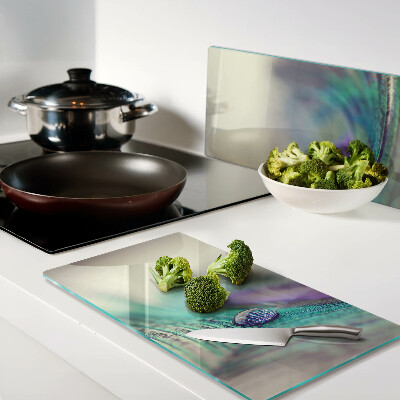 Glass kitchen board A drop on a leaf