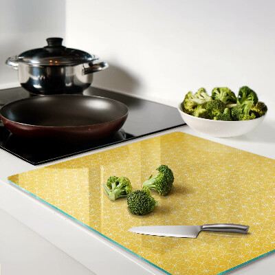 Glass kitchen board Flower of life on a yellow background