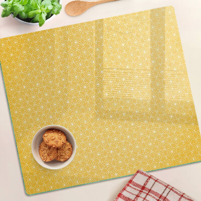 Glass kitchen board Flower of life on a yellow background