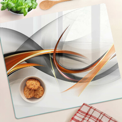 Glass kitchen board Abstract waves in shades of gold