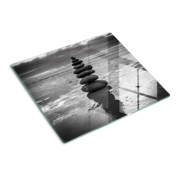 Glass kitchen board Beach stones in black and white