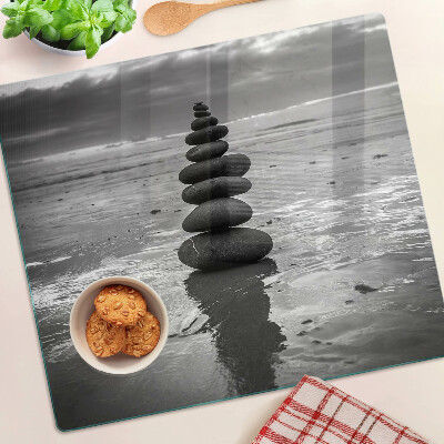 Glass kitchen board Beach stones in black and white