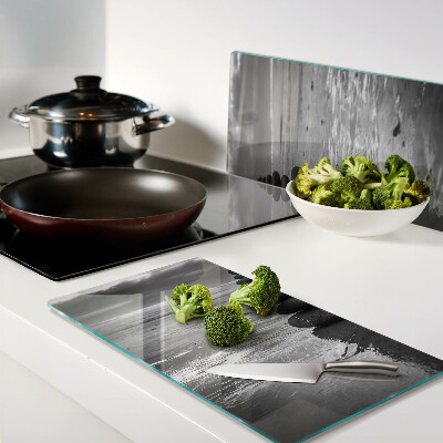 Glass kitchen board Beach stones in black and white