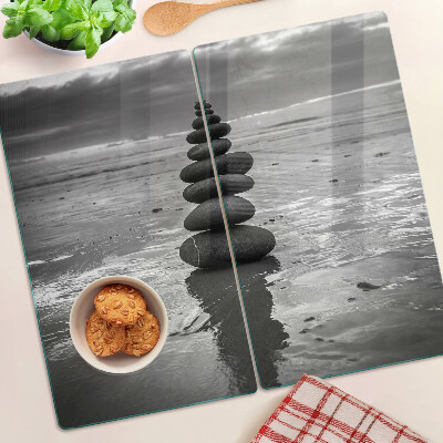 Glass kitchen board Beach stones in black and white