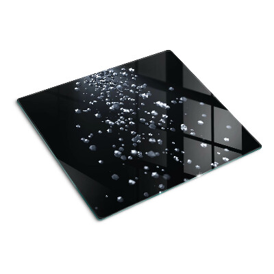 Glass kitchen board Crystal bubbles on a black background