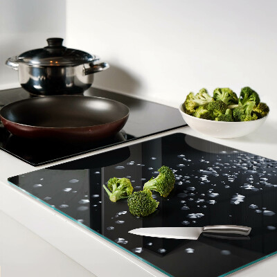 Glass kitchen board Crystal bubbles on a black background