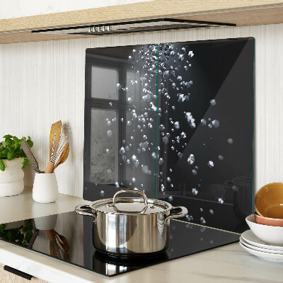 Glass kitchen board Crystal bubbles on a black background