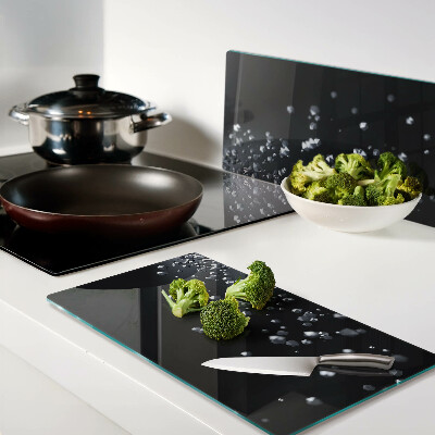 Glass kitchen board Crystal bubbles on a black background