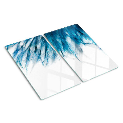 Glass kitchen board Blue feathers on white background