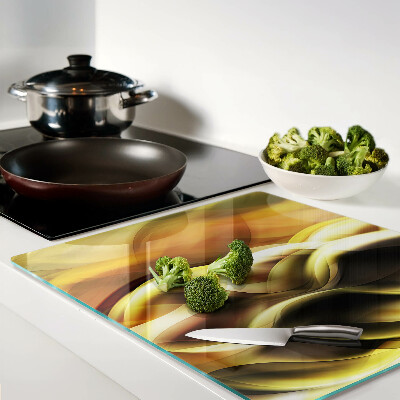 Glass kitchen board Abstract waves in shades of gold