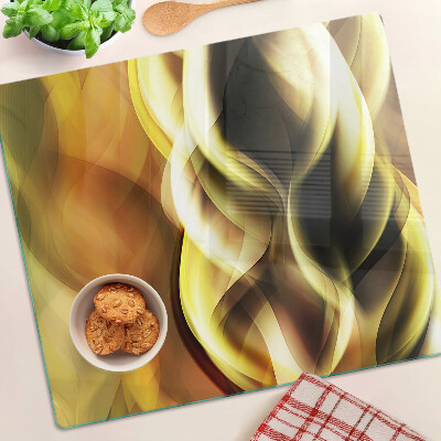 Glass kitchen board Abstract waves in shades of gold