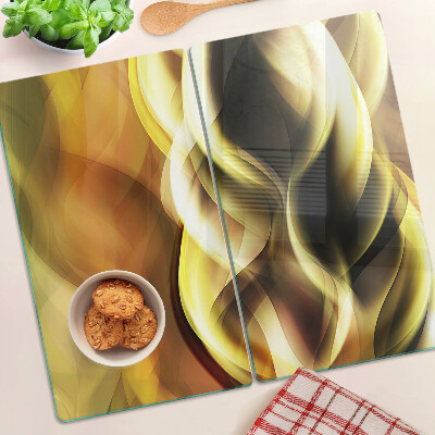 Glass kitchen board Abstract waves in shades of gold