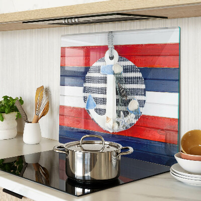 Glass kitchen board Anchor against the background of stripes