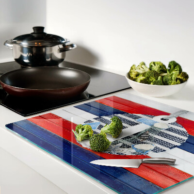 Glass kitchen board Anchor against the background of stripes