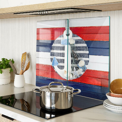 Glass kitchen board Anchor against the background of stripes