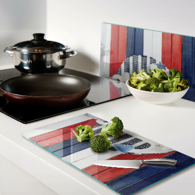 Glass kitchen board Anchor against the background of stripes
