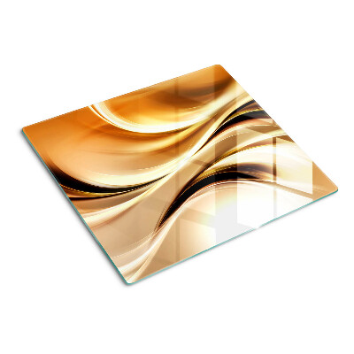 Glass chopping board Abstract waves in shades of gold