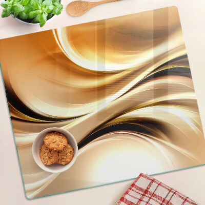 Glass chopping board Abstract waves in shades of gold