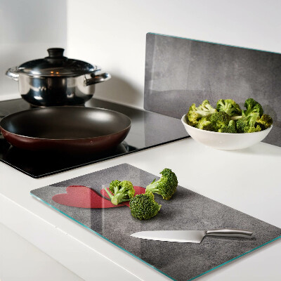 Glass chopping board Heart in the background of the window