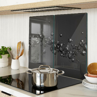 Glass kitchen board Black crystals on the background