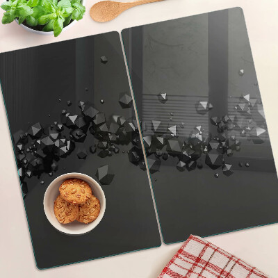 Glass kitchen board Black crystals on the background