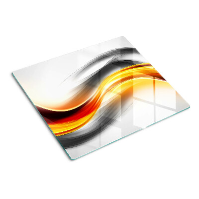 Glass chopping board Waves in orange and black