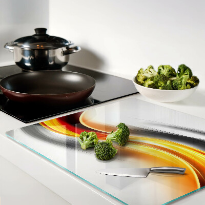 Glass chopping board Waves in orange and black