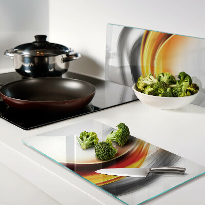Glass chopping board Waves in orange and black