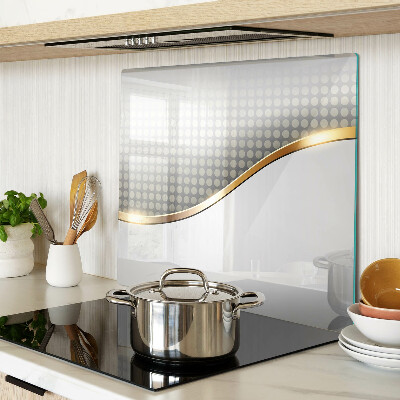 Glass kitchen board Golden wave on a background of dots