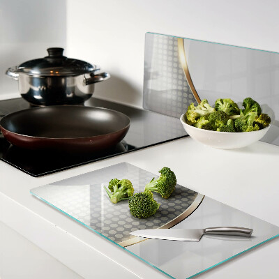 Glass kitchen board Golden wave on a background of dots