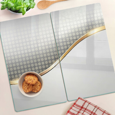 Glass kitchen board Golden wave on a background of dots
