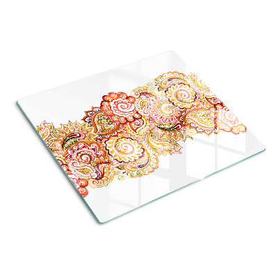 Glass chopping board Paisley motif in shades of red and gold