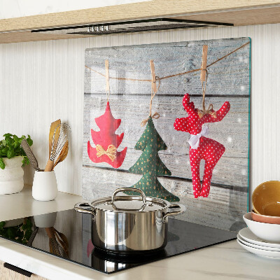 Glass chopping board Christmas decorations on a wooden background