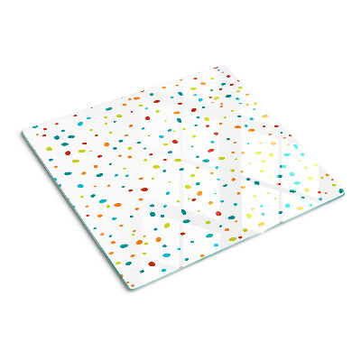 Glass chopping board Colored dots on white background