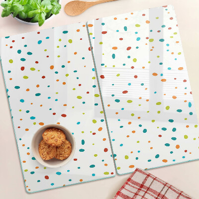 Glass chopping board Colored dots on white background