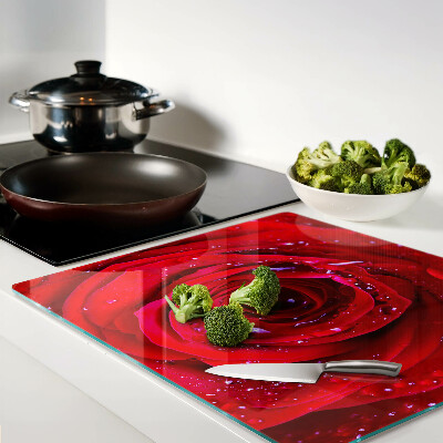 Glass kitchen board Red rose with water drops