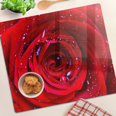 Glass kitchen board Red rose with water drops