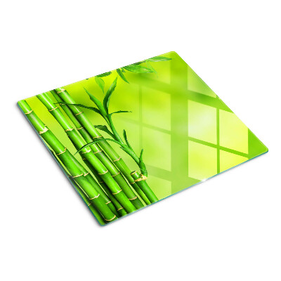 Glass chopping board Bamboo on a green background