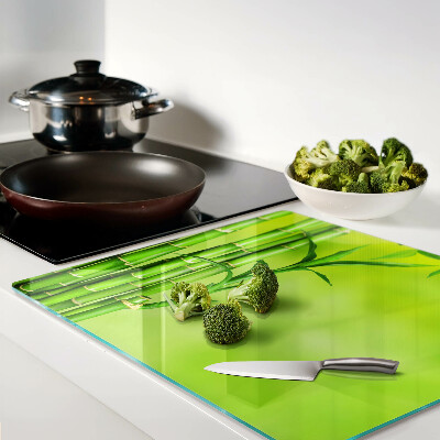Glass chopping board Bamboo on a green background