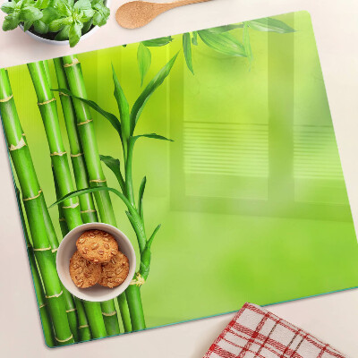 Glass chopping board Bamboo on a green background