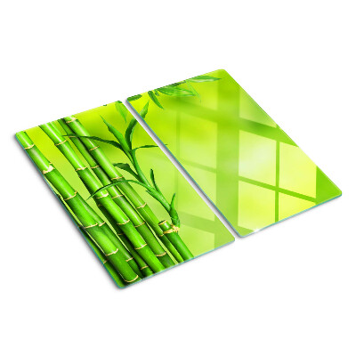Glass chopping board Bamboo on a green background