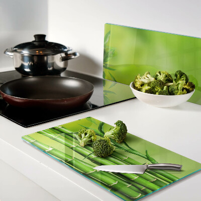 Glass chopping board Bamboo on a green background