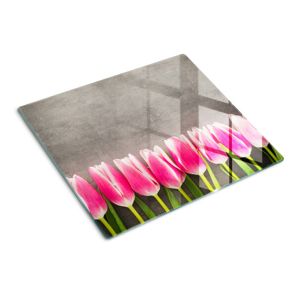 Glass chopping board Tulips on a gray background