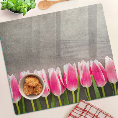 Glass chopping board Tulips on a gray background